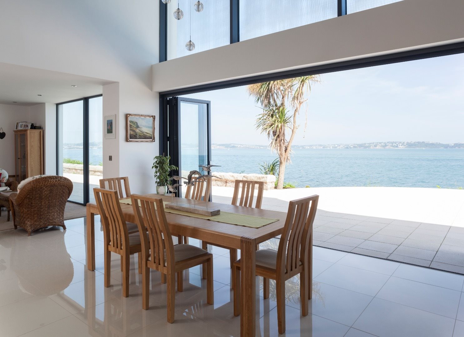 What are the surprising bi-fold doors benefits that can improve your indoor-outdoor living experience?